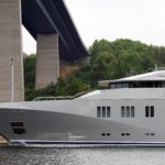 Profile of Superyacht Skat in Kiel Canal passing under a bridge